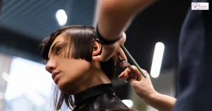 Seasonal hair-cutting services in Winnipeg, MB, showing a stylist cutting hair in a modern salon.
